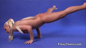 Cute blonde shows nude gymnastics